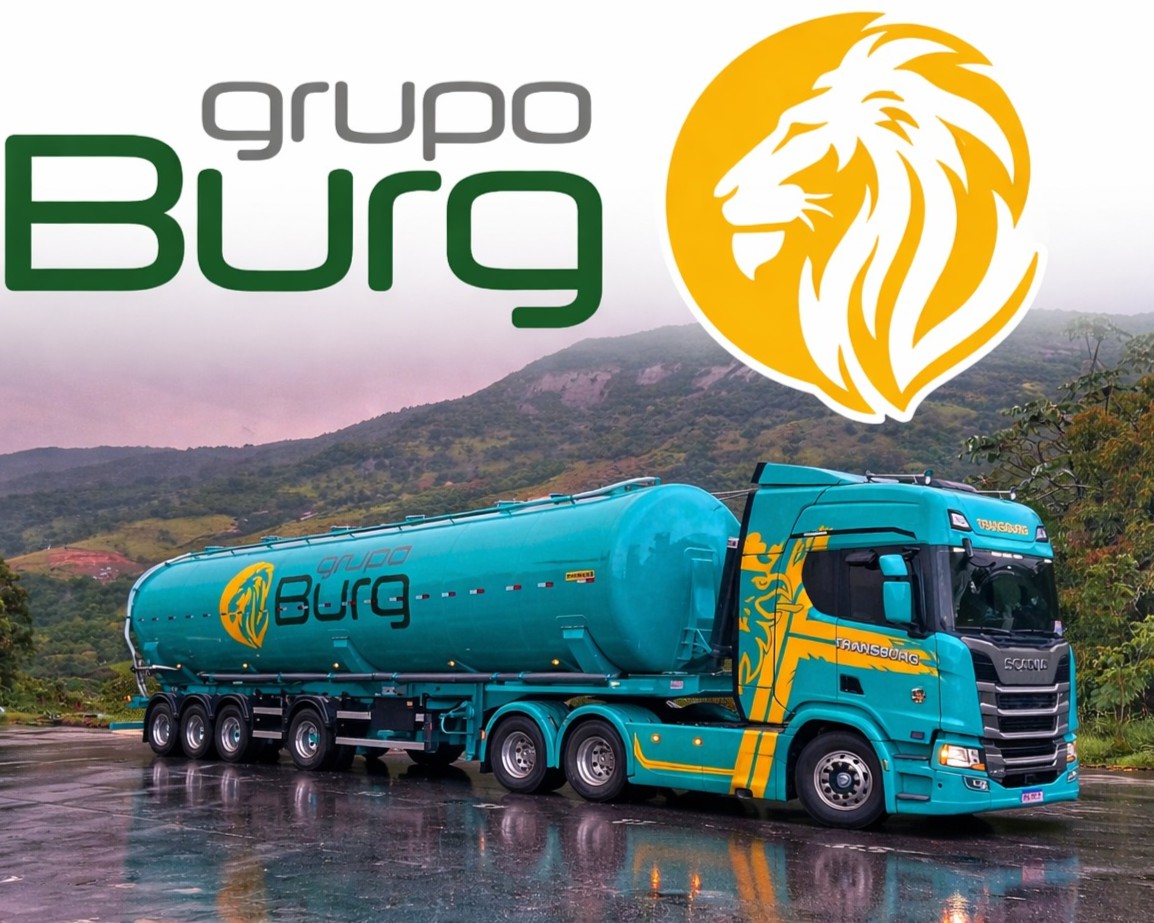 Caminhão silo com a logo da empresa em destaque